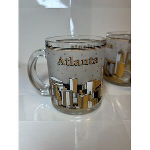 2 Atlanta Frosted Gold and Black City Building Stars Clear Glass Mugs